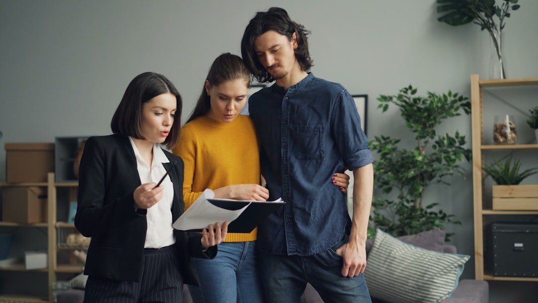 real estate agent showing house
