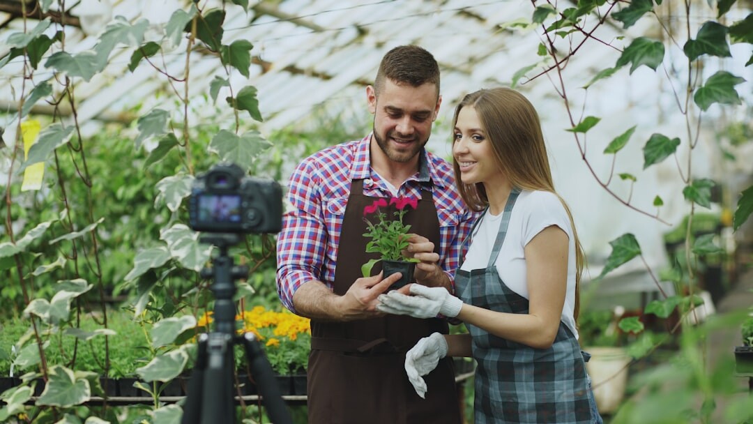 Elderly Lithuanian couple tending a vegetable garden