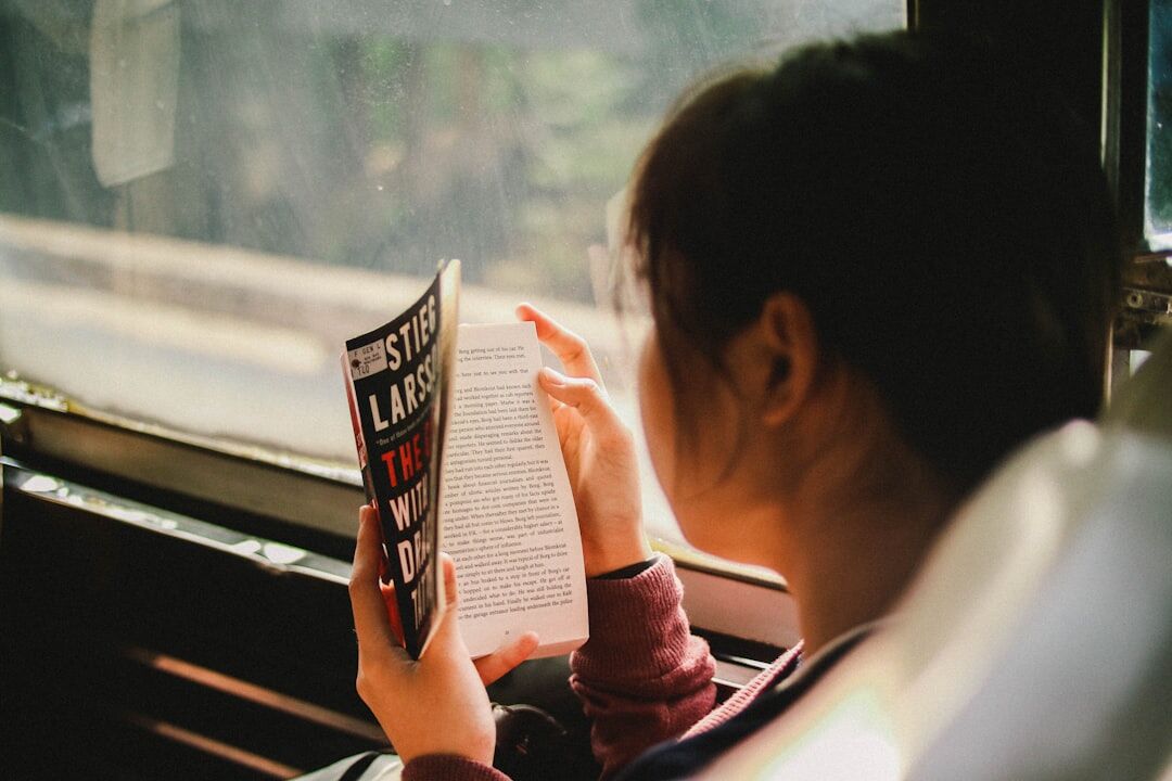 person reading business book